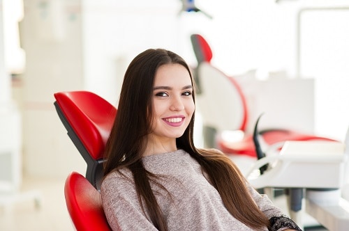 young woman in dental chair